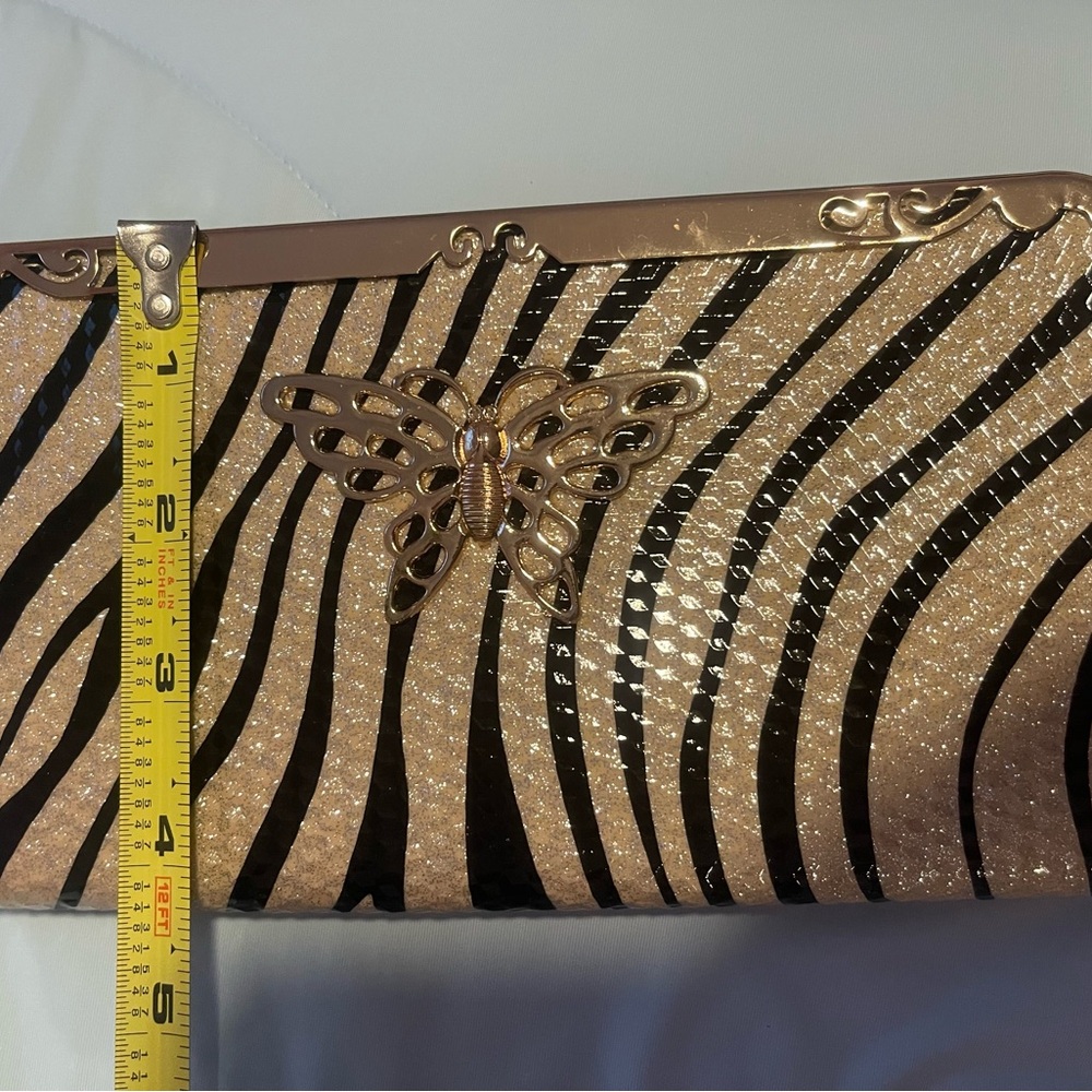 Animal print with butterfly metal details wallet. 8”x 4”x 1” - Picture 5 of 10